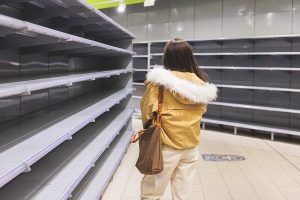 View of empty supermarket shelves, grocery store work stoppage closes, sanctions and embargo, panic buying with supplies and goods shortage, food hunger crisis and deficit concept