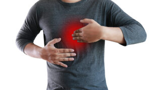 MAN with symptomatic acid reflux suffering from acid reflux